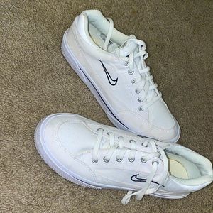 Nike Retro Gts. White with blue outlined Nike Swoosh. Women Size 7.